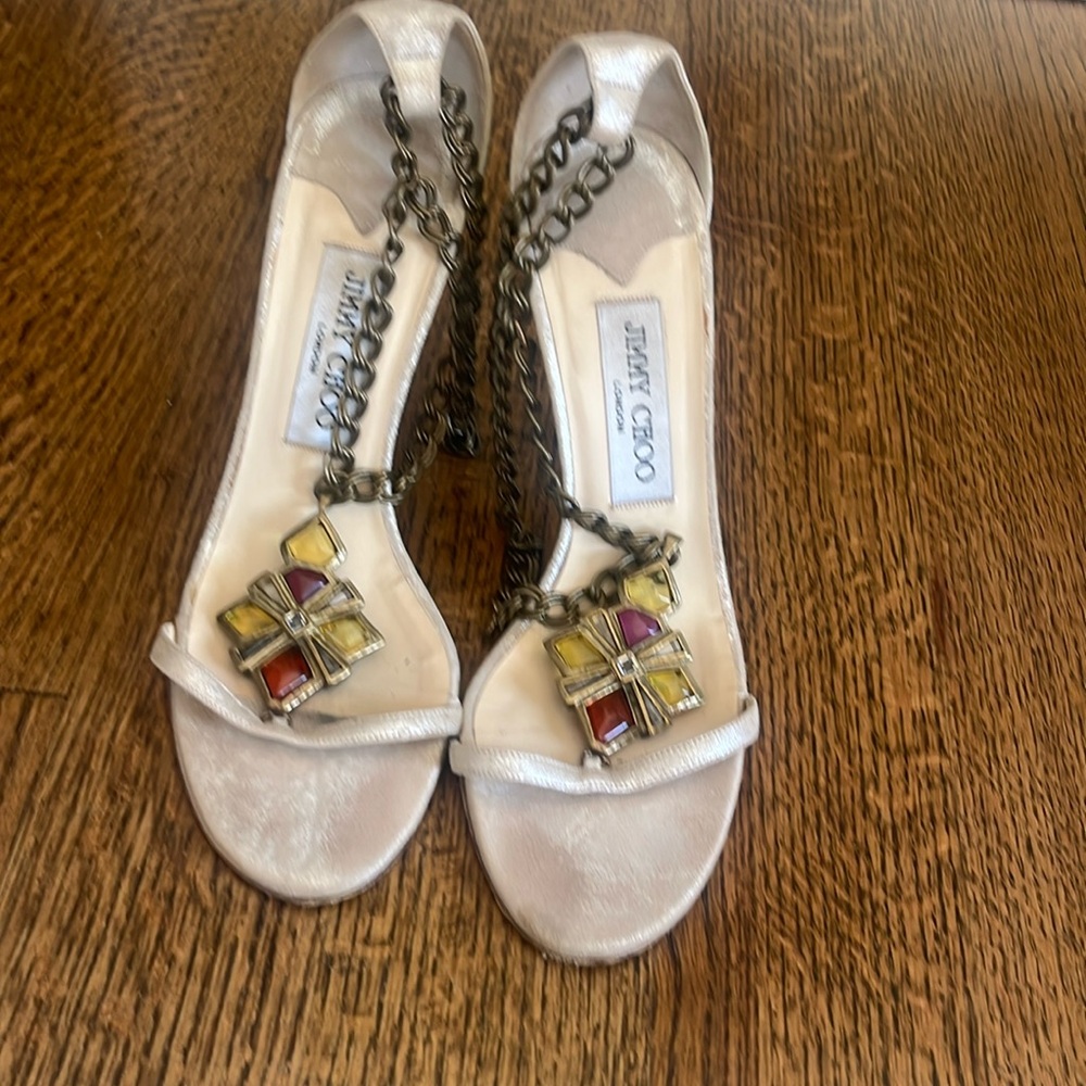 Jimmy Choo gold suede sandals.   Sold as is.